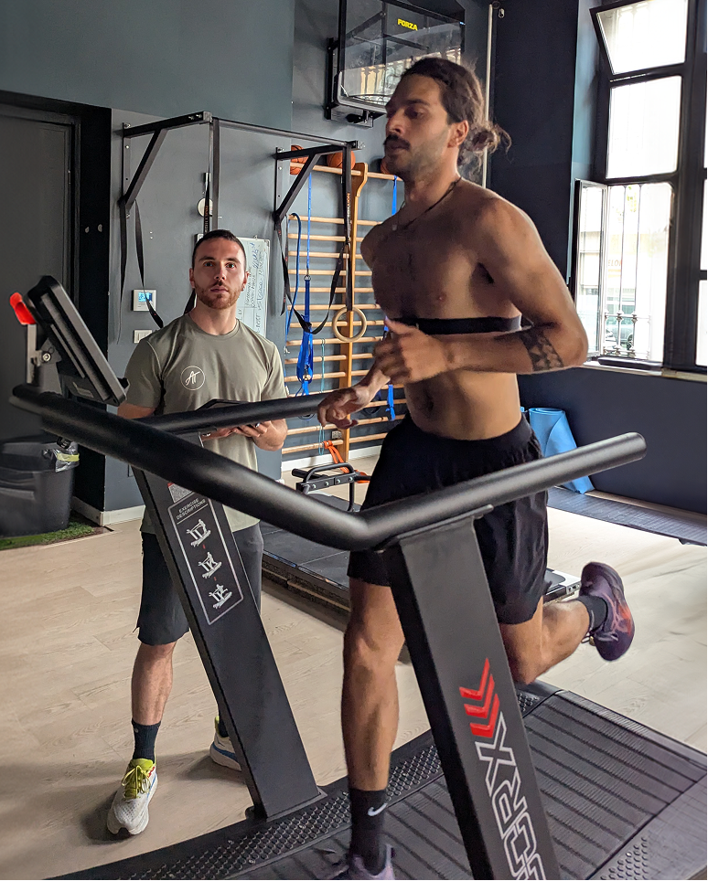 Andrea Tortorella monitoring an athlete during a treadmill running test